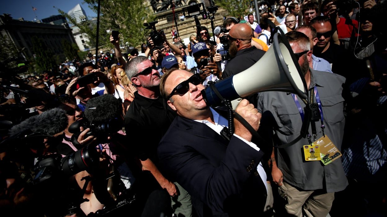 Alex Jones is so eager to stay on Twitter he