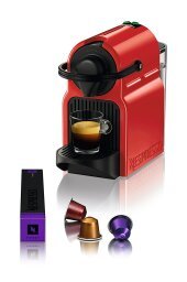red espresso machine with mug of coffee, pods in front center